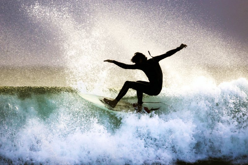 Surfer on the Lip of a Wave